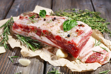 Poster - raw bacon with spices on wooden table