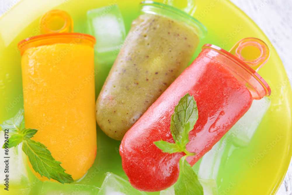 Delicious ice cream on plate on table close-up