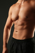 © Africa Studio - Handsome muscle young man on dark background