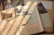 Old postcards, letters and atlas.