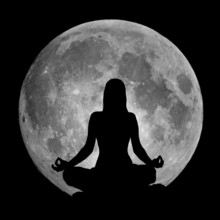 Yoga Lotus Position Silhouette Against The Moon