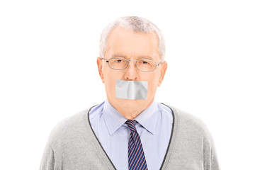 Canvas Print - Portrait of a senior with a duct taped mouth