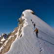 Leinwandbild Motiv Climbing a mountain
