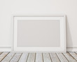 © mtlapcevic - blank white horizontal picture frame on the wall