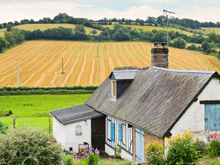 Canvas Print - peasant farm and harvested field in Normandy