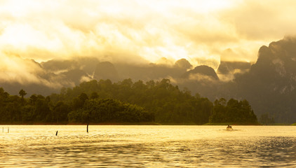 Wall Mural - beautiful scene of boat in morning at ratchaprapa dam, suratthan
