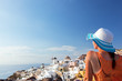 © Photocreo Bednarek - Happy tourist woman on Santorini island, Greece. Travel