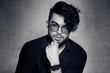 © matusciac - sexy fashion man model dressed casual wearing glasses posing