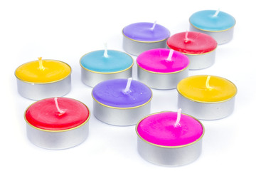 Colorful christmas decoration with different candles on backgrou