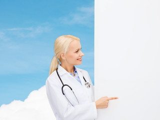 Poster - smiling female doctor with stethoscope