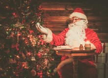 Santa Claus In Wooden Home Interior 