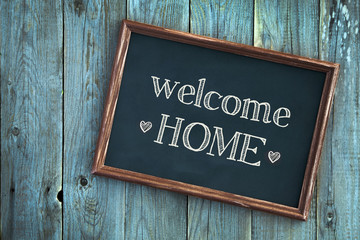Wall Mural - wooden vintage frame WELCOME HOME over wooden background