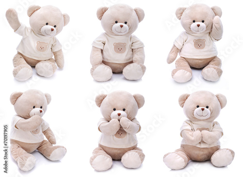 Teddy bears in different po...
