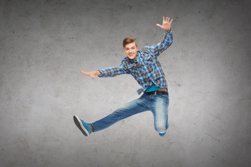 Sticker - smiling young man jumping in air