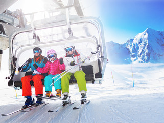 Fototapete - Ski, skiing - skiers on ski lift