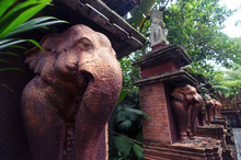 Stone Elephant Statues Of Bronze Color In A Sacred Park