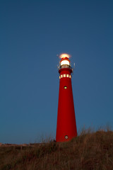 Fototapete - lighthouse at night, Schiermonnikoog island