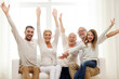 © Syda Productions - happy family sitting on sofa at home