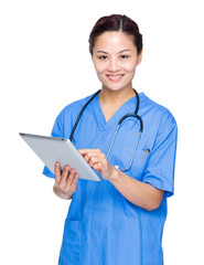 Wall Mural - Female doctor use of tablet