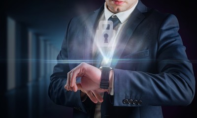 Poster - Composite image of businessman using hologram watch