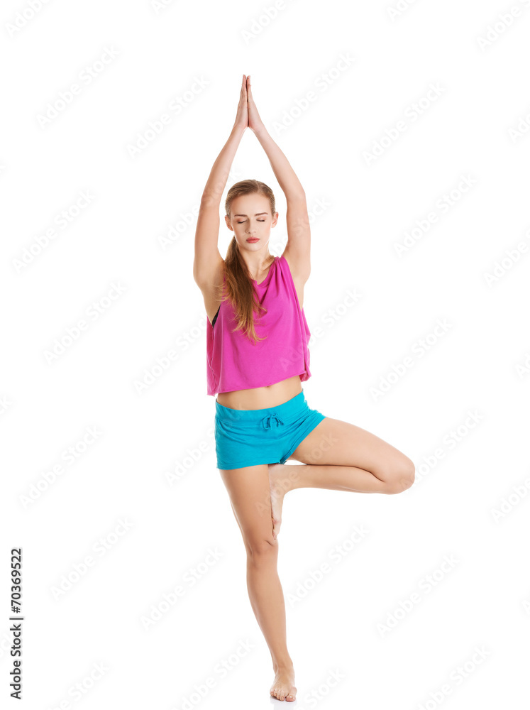 Young Stretch Routine Young healthy girl doing stretching exercises Stock Photo | Adobe Stock