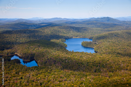 Fotografia, Obraz Adirondack forests and lakes summer aerial view from light aircr