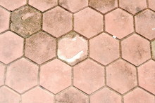 Red Radial Stone Paving On The Street