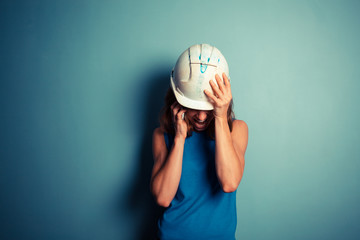 Wall Mural - Female builder on the phone