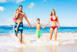 © EpicStockMedia - Happy Family at the Beach