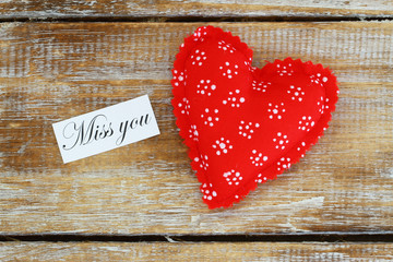 Wall Mural - miss you card with red heart on rustic wooden surface