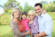 © goodluz - Portrait of happy family of four