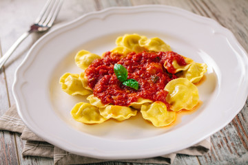 Wall Mural - Ravioli with tomato sauce