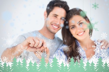 Poster - Man and wife holding a key with a house keychain