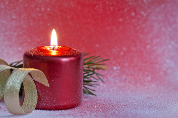 Wall Mural - Christmas red candle closeup background concept