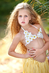 Wall Mural - portrait of little girl in tropical style