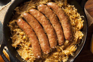 Wall Mural - Roasted Beer Bratwurst with Saurkraut