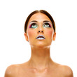© Drobot Dean - Attractive young model with bright make-up looking up
