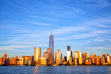 Fototapeta Miasta - One World Trade Center and Manhattan skyline at sunset, New York