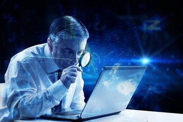 Poster - Mature businessman examining with glass