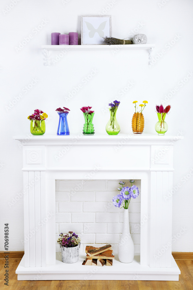 Fireplace with beautiful decorations in living room