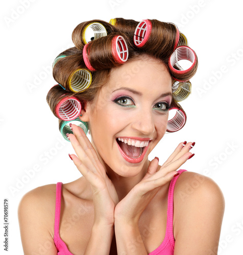 Fototapeta dla dzieci Beautiful girl in hair curlers isolated on white