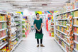 © DragonImages - Hispanic man in a supermarket