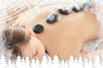 Bright woman lying on a massage table