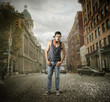 © olly - Young man in the streets of a big city