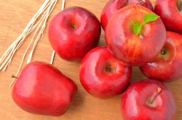 red apple on wood background