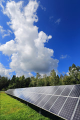 Detail of Solar Power Station on the summer Meadow