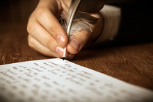 Writer Writes A Fountain Pen On Paper Work