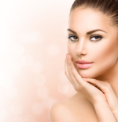 Wall Mural - beautiful young woman with clean fresh skin close up