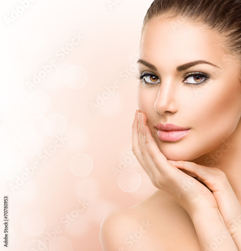 Fototapeta na wymiar Beautiful Young Woman with Clean Fresh Skin close up