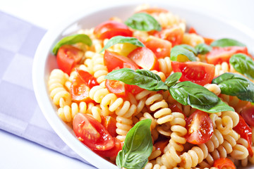 Wall Mural - Pasta with fresh tomatoes and basil